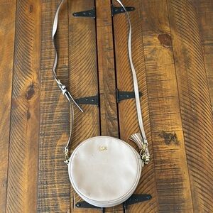 Michael Kors light pink Round Crossbody Bag